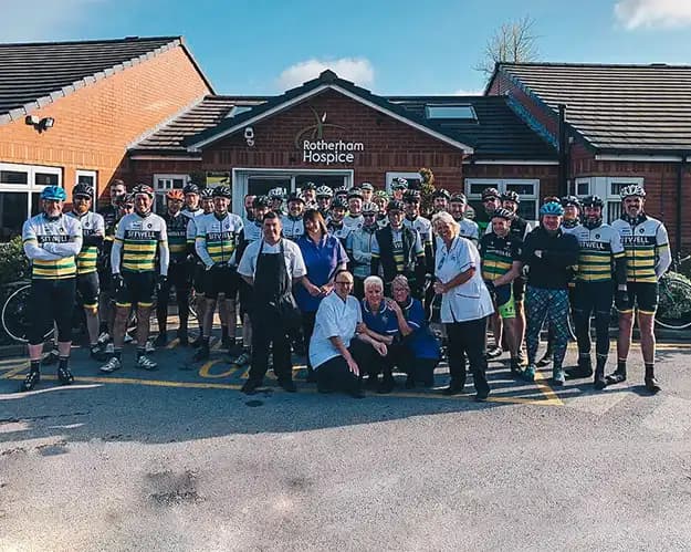 A landscape photograph of Club members at Rotherham Hospice