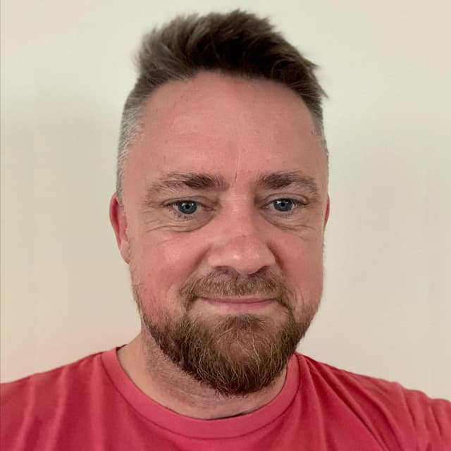 A portrait photograph of Rob O'Reilly