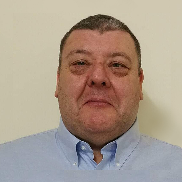 A portrait photograph of Chris Habershon