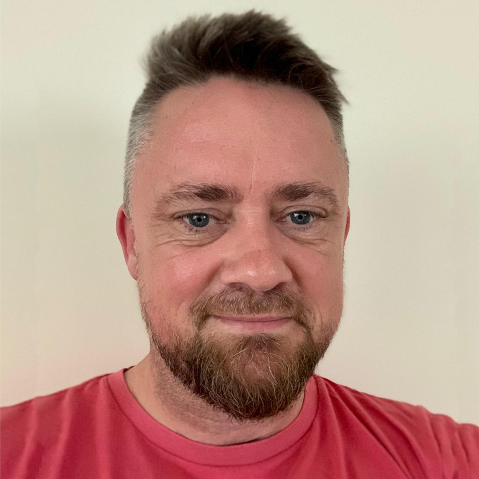 A portrait photograph of Rob O'Reilly